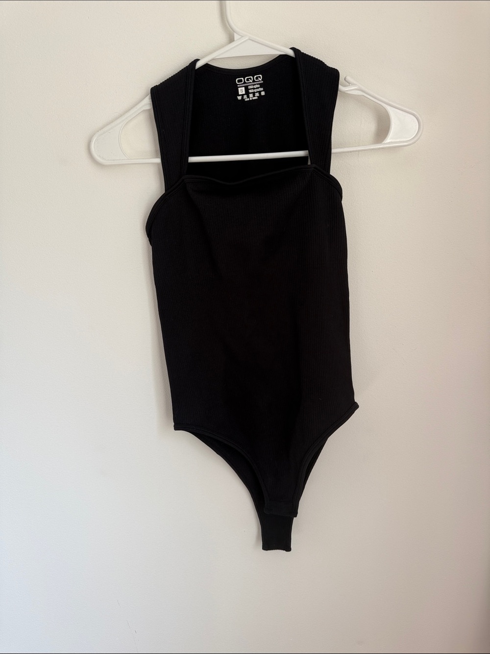Black Ribbed One-Piece Bodysuit by